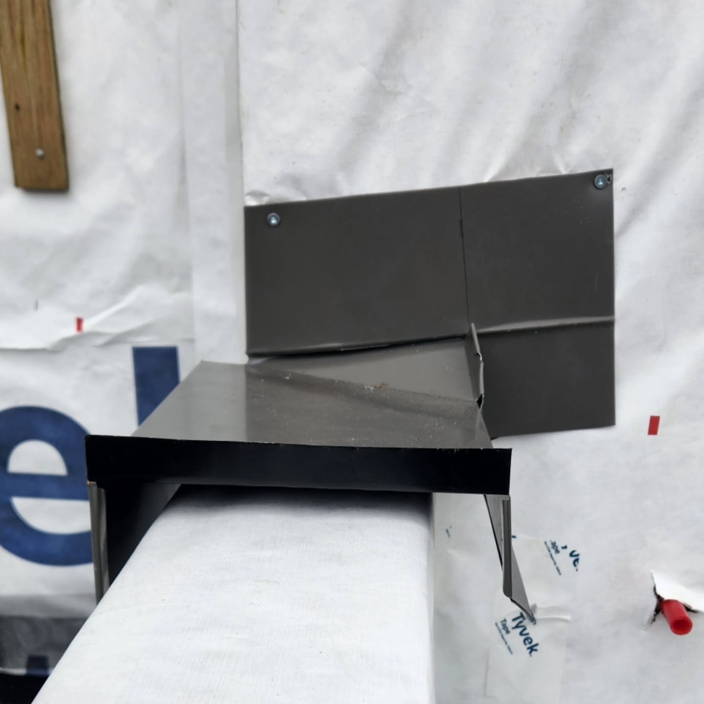 Precision metal flashing installation on Fraser Valley home